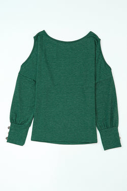 Asymmetrical green buttoned high with long sleeves and cutouts