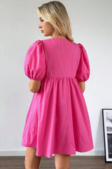 Mini-robe rose vif à manches bouffantes *