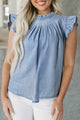 Retro high in pleated chambray with ruffles and buttoned on the back beautiful blue