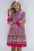 Purple High Neck Puff Sleeve Smocked Floral Mini Dress