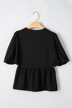 Camisa negra de Peplum con mangas hinchadas *