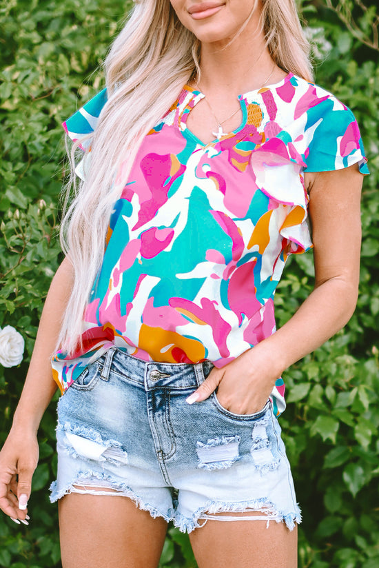 Multicolored blouse with abstract print and notched collar with floating sleeves