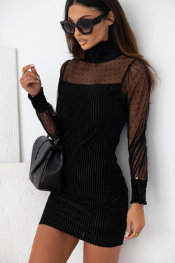 Black dress with bubble sleeves and ruffled collar striped in polka dot stitch