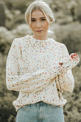 Suéter de cuello redondo en tejido retorcido *