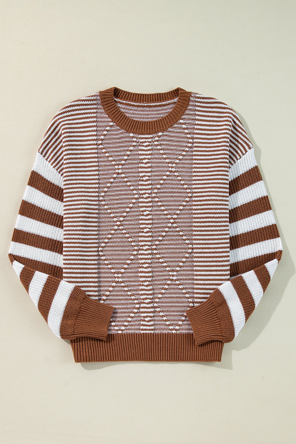 Brown sweater with textured geometric stripes and dropped shoulders