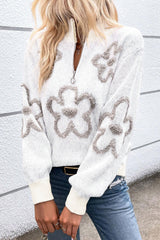 White high neck sweater with half zip and contrasting flowers
