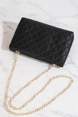Petit sac d’épaule noir en simili cuir texturé à chaîne dorée
