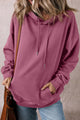 Valériane loose fit hoodie with drawstring and kangaroo pocket in solid color