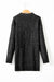 Large black sweater dress in twisted knitted with drooping shoulders