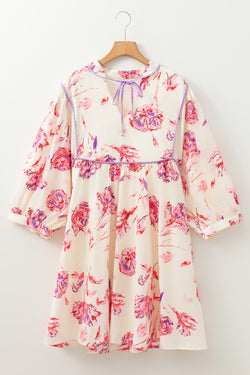 Mini dress with floral print with lace -ups and V -neck with large white balloon sleeves