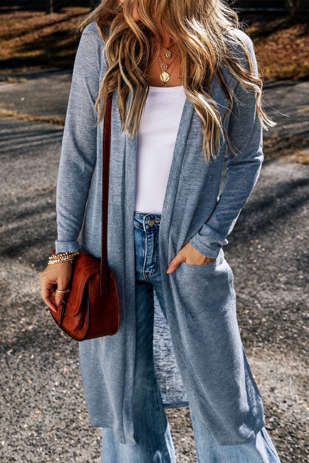 Cardigan long ouvert sur le devant avec poches en tricot flammé bleu