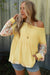 Yellow Babydoll Babydoll in embossed knitting with floral pattern and patchwork