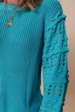 Turquoise bubble sleeve sweater with ruffled eyelets