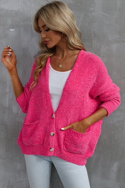 Cardigan pull avec poches sur le devant et boutons roses