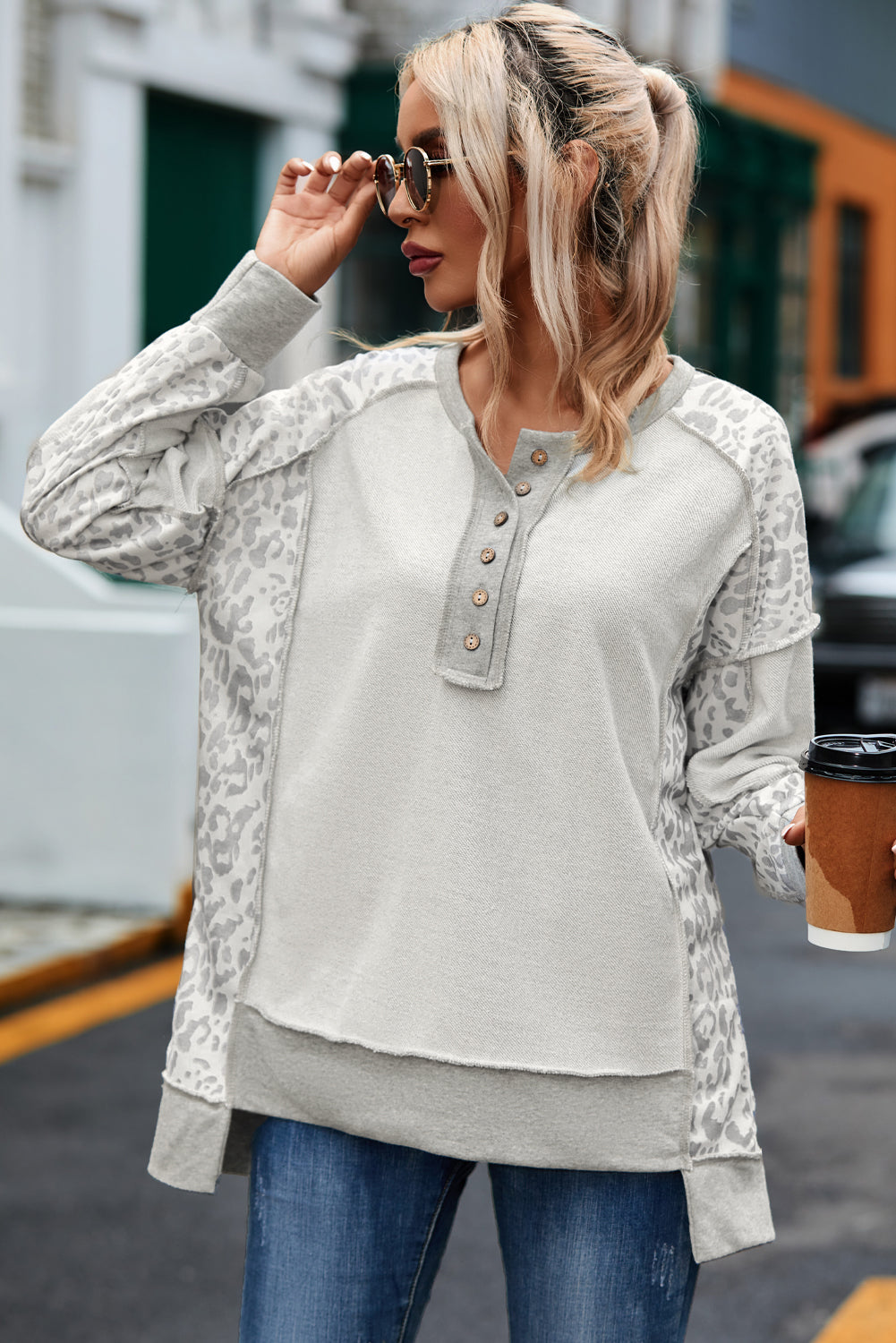 Gray Sweatshirt with buttoned collar and exposed seams in leopard patchwork