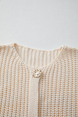 Gilet pull boutonné blanc en tricot texturé uni avec poches latérales