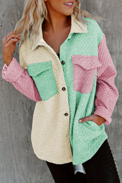 Green quilted jacket with flap pocket and color block patchwork