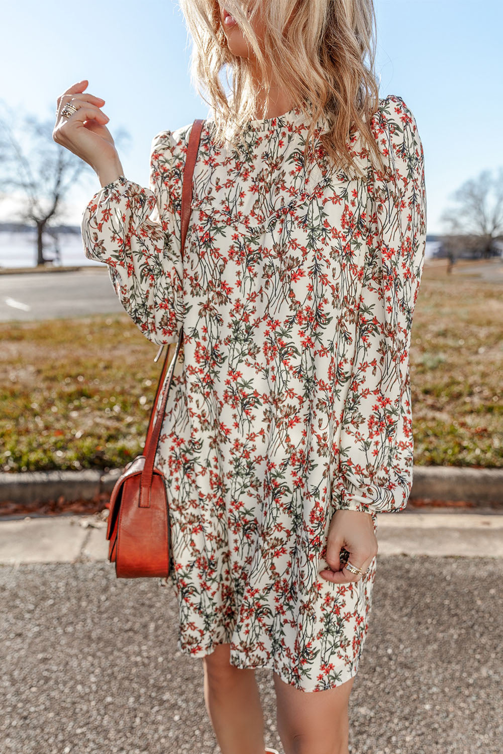 White long sleeve mini dress with floral print