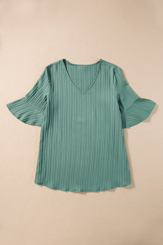 High textured with ruffles and mid-long sleeves *