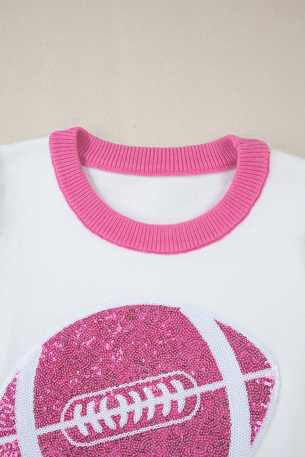 Pull à manches courtes bouffantes à blocs de couleurs Rugby à sequins rose