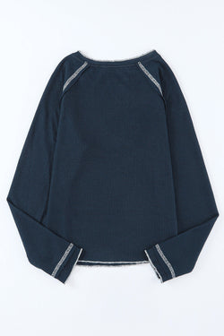 Blue textured high with long sleeves and round neck *