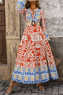 Vestido largo naranja con mangas largas y estampado geométrico boho