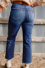 High-waisted flared jeans in sail blue with mineral wash and raw hem