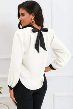 White blouse with uphill collar with knot in the back and color blocks