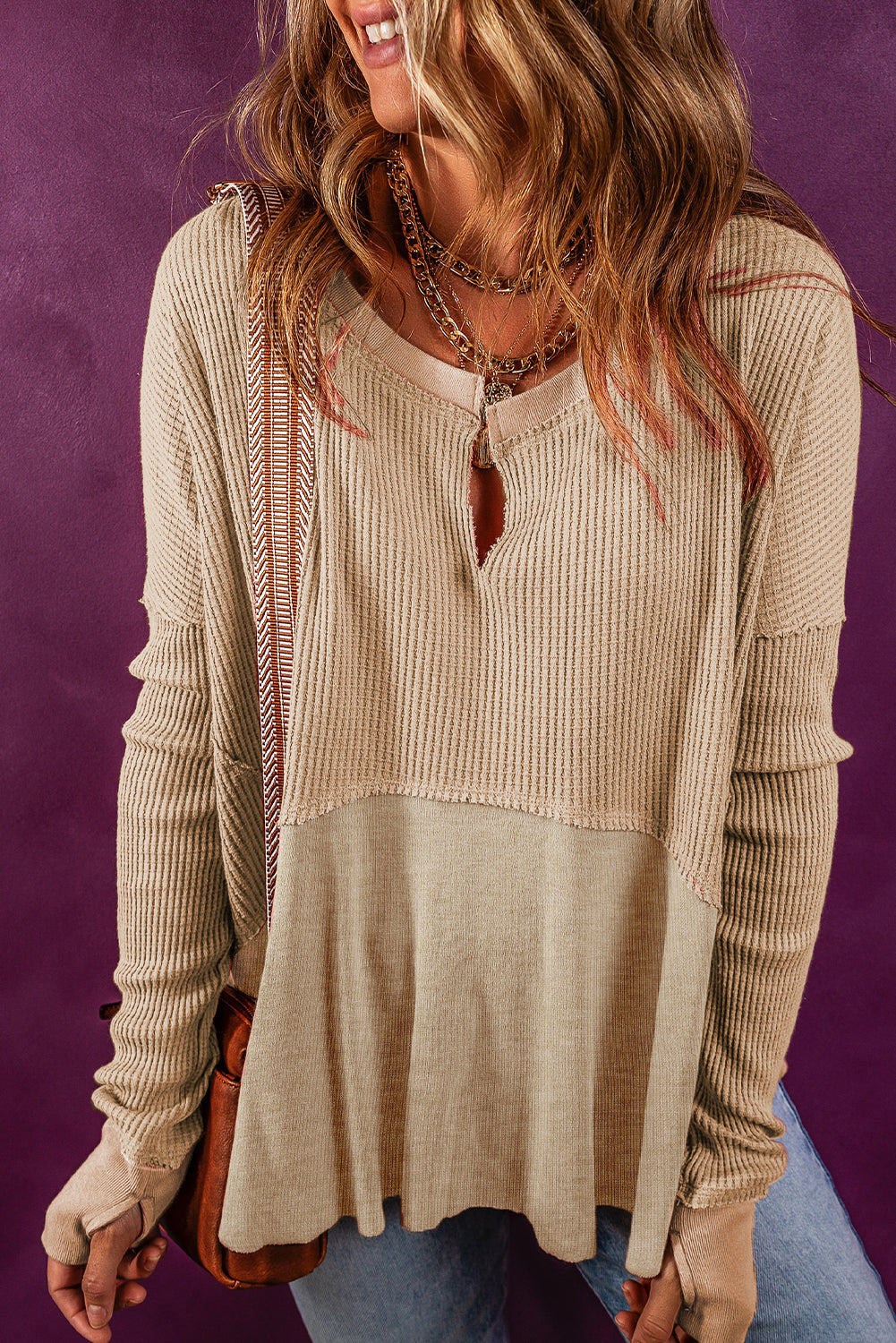 Light French beige waffle knit patchwork top with exposed seams and split collar