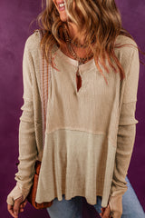 Light French beige waffle knit patchwork top with exposed seams and split collar