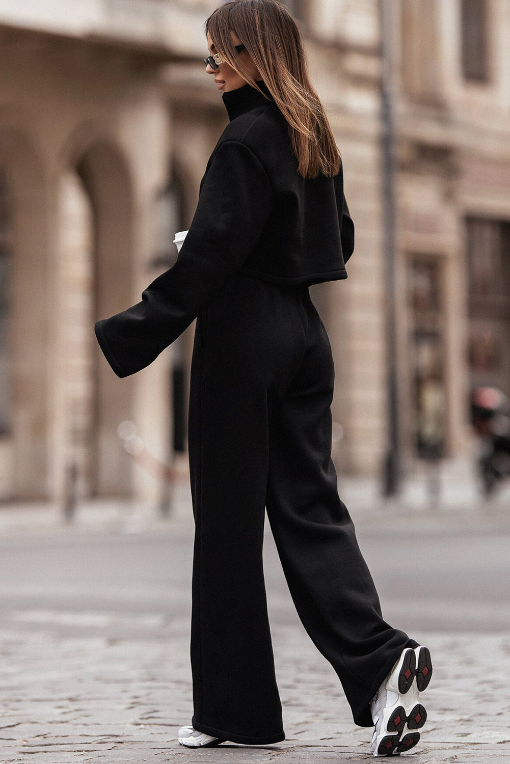 Black zip neck crop top and wide leg pants set