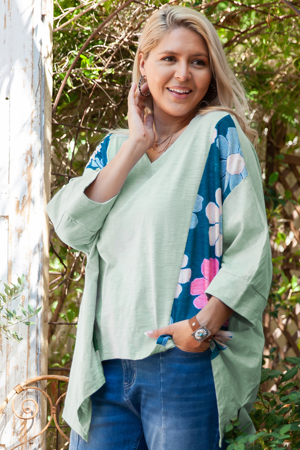 Large top green top in patchwork of flowers