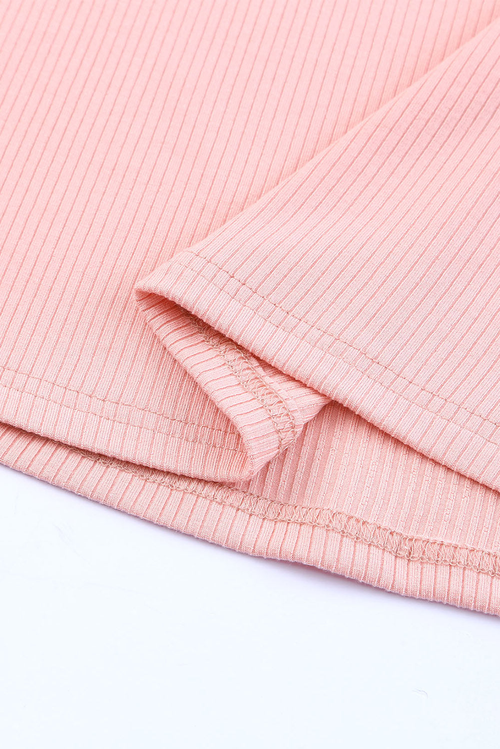 Pink ribbed knitting high with robbery in polka dots