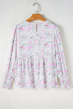 Babydoll pink blouse with floral print and frozen balloon sleeves with lock hole on the back