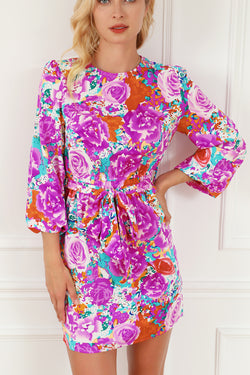 Purple floral dress with keyhole back and long sleeves with belt