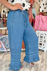 Pantalon large en chambray bleu crépuscule à ourlet volanté