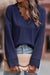 Blue long sleeve v-neck top with lace trim and ribbed texture