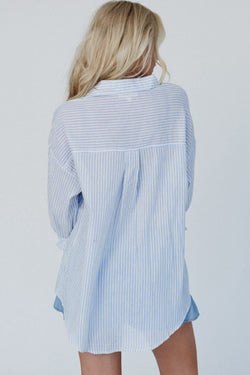 Long sleeve shirt buttoned with sky blue striped