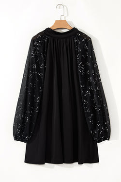 Black mini dress with shimmering mesh sleeves and high neck