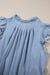 Retro high in pleated chambray with ruffles and buttoned on the back beautiful blue