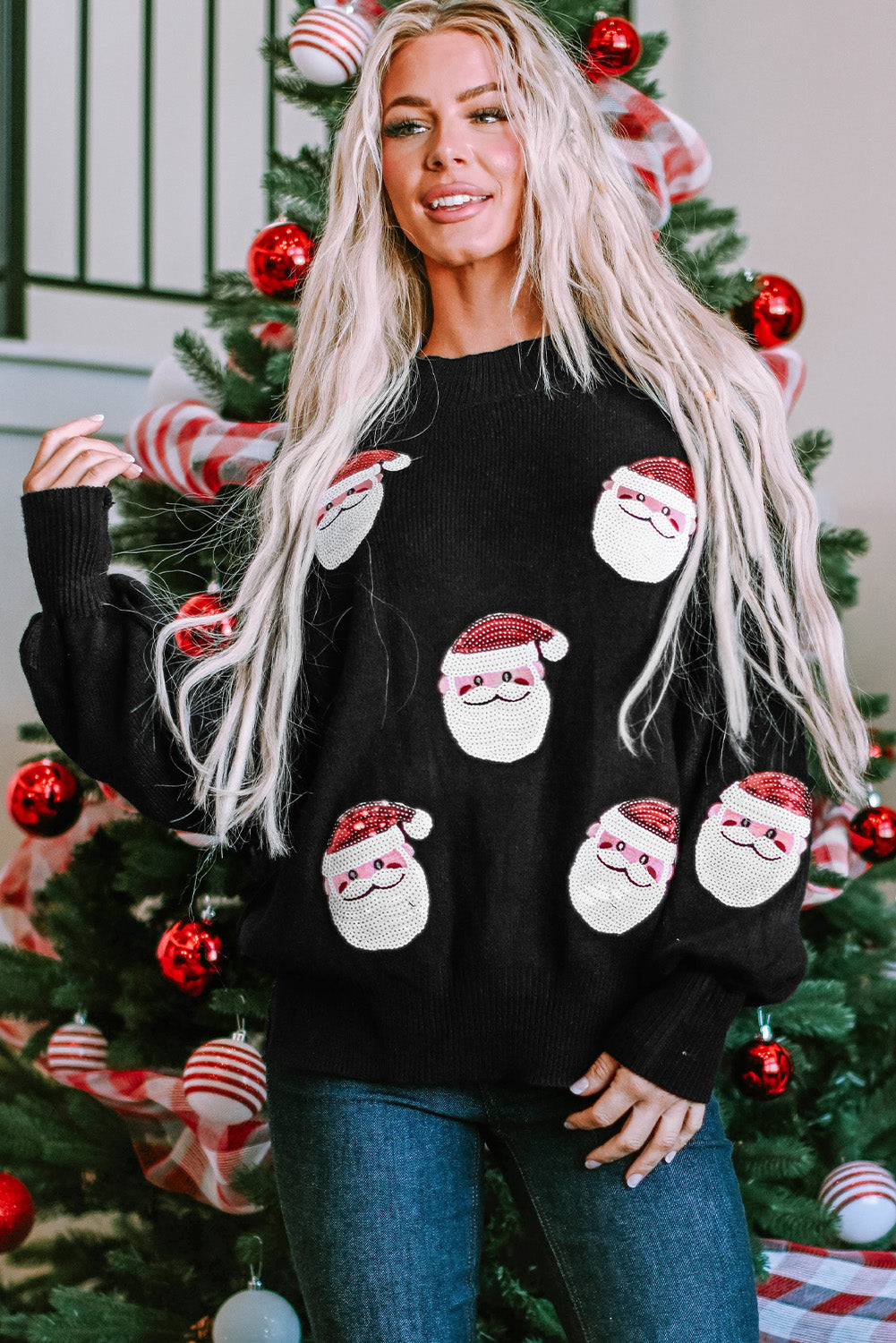 Pull noir à paillettes avec manches évêque du Père Noël