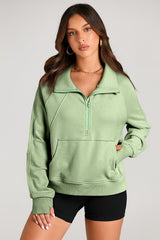 Smoke green sweatshirt with kangaroo pocket and stand-up collar with quarter zip