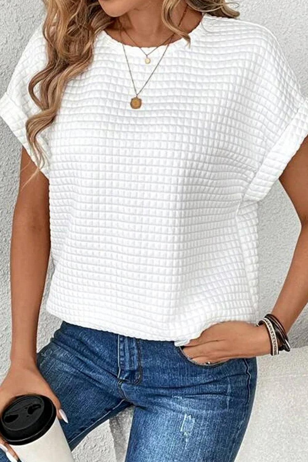 White T-shirt with textured checkered bat handles