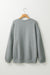 Middle-to-sloping gray oversized gray sweatshirt and side slit