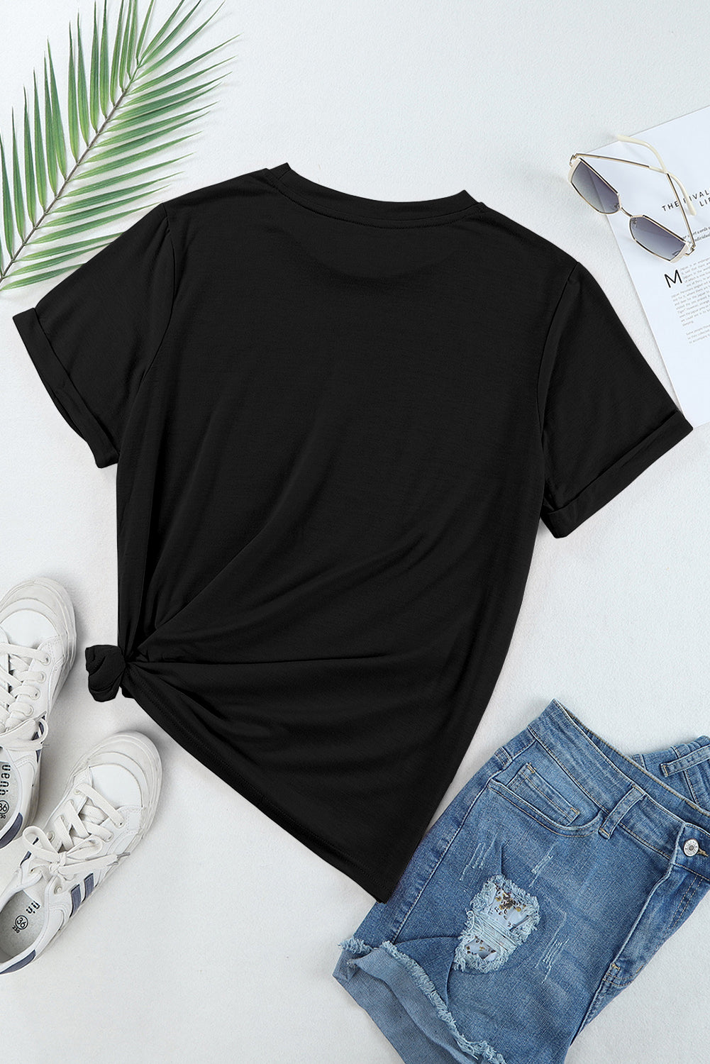 Camiseta negra relajada con placas redondas