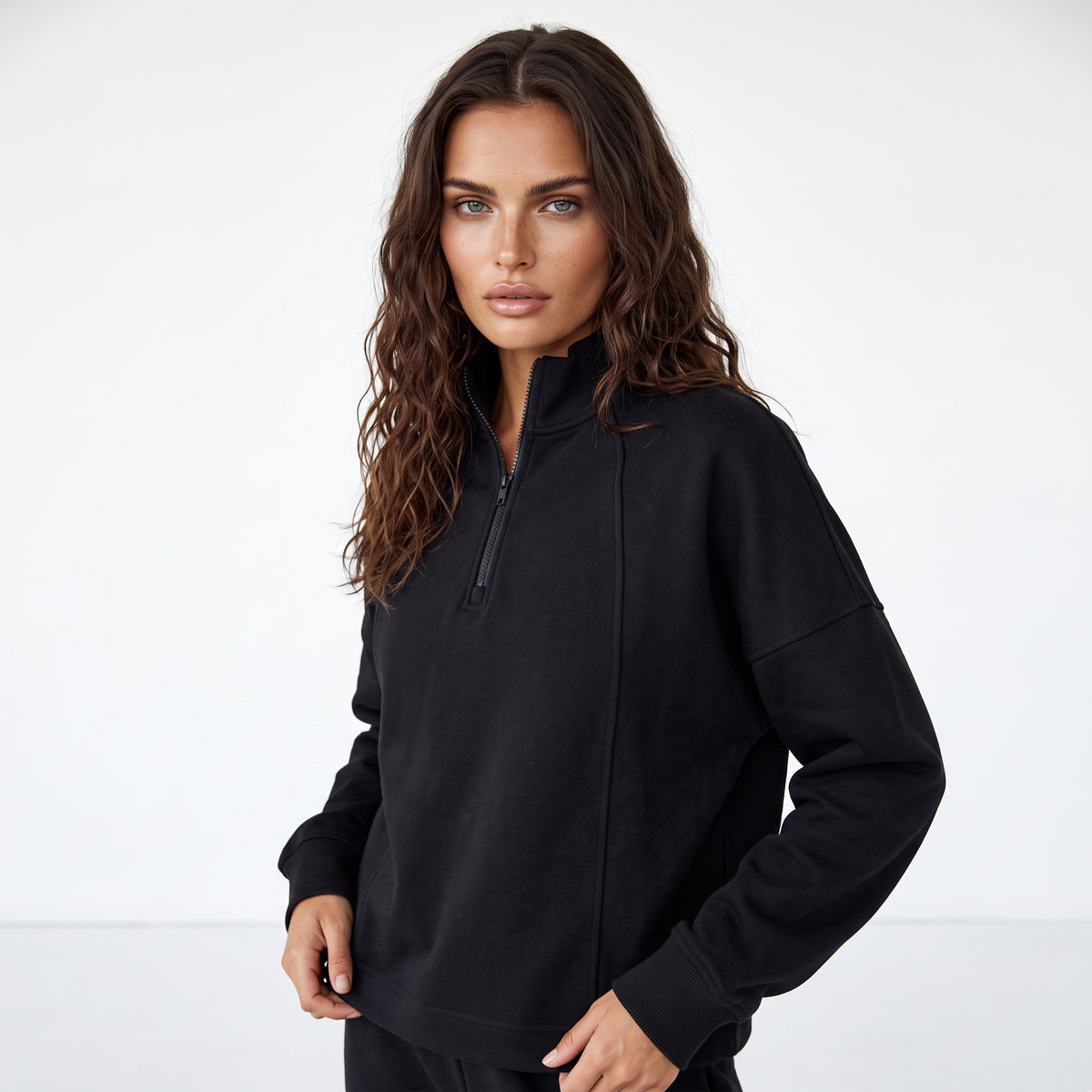 Black zip-up sweatshirt with dropped shoulders