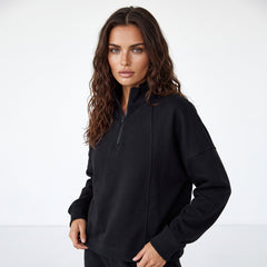 Black zip-up sweatshirt with dropped shoulders