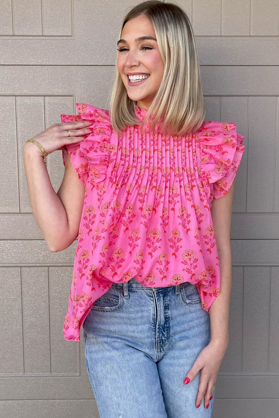 Flying blouse with ruffles and floating sleeves with red pink floral print