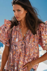 Blusa naranja con estampado floral *