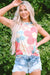 Sleeveless round neck top with pink floral print